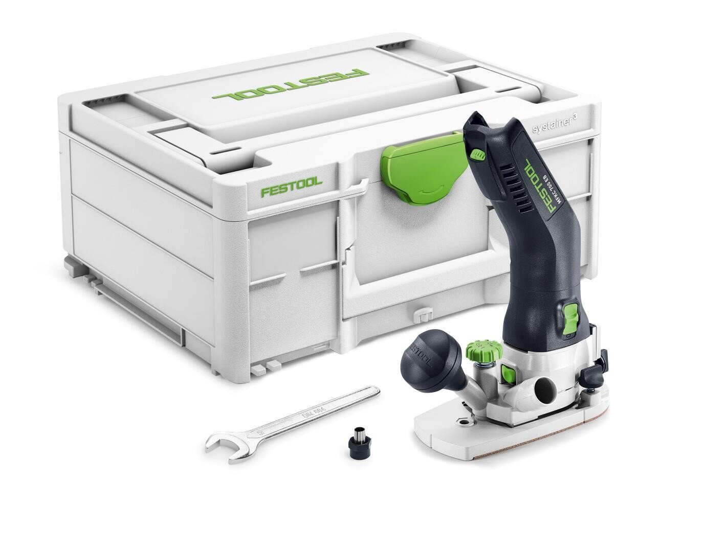 Une défonceuse compacte de Festool avec une poignée noire et verte est assise devant son coffret blanc, accompagnée d'une clé à molette et d'une petite pièce d'appoint.